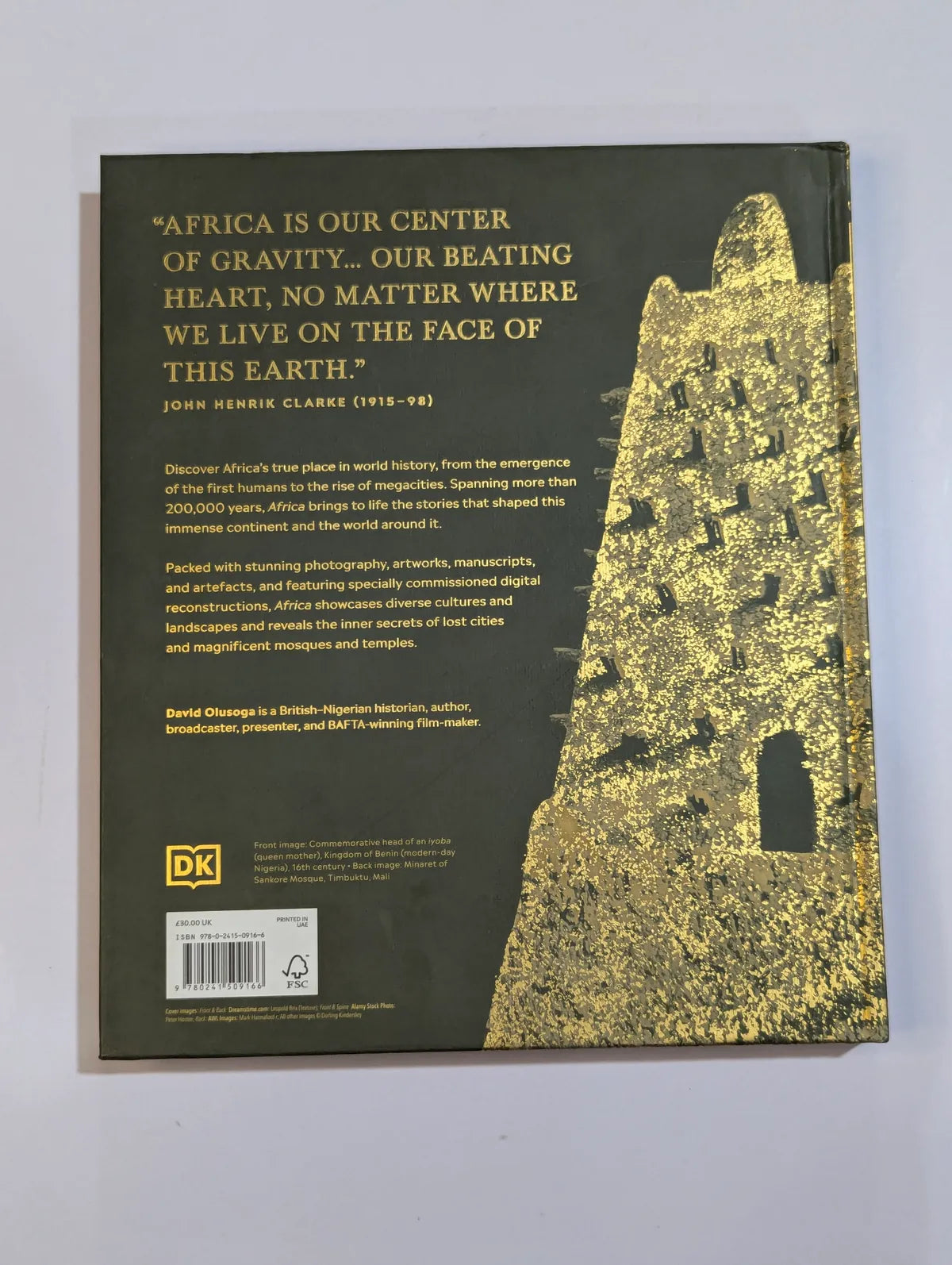 Book cover with text and a map design on a gray background