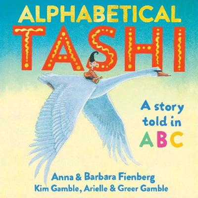 The cover of the book 'Alphabetic Tashi' features an illustration of a boy riding a dragon, with a colorful background and decorative lettering.