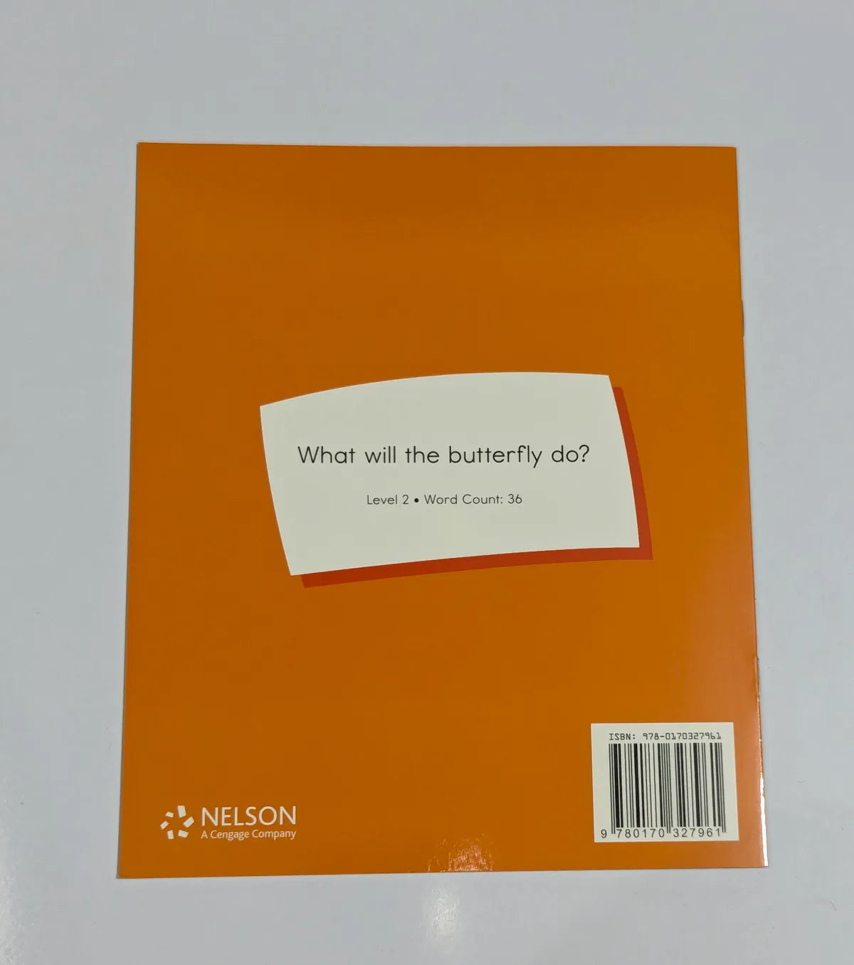 Orange book cover with a white label and Nelson logo on a gray background