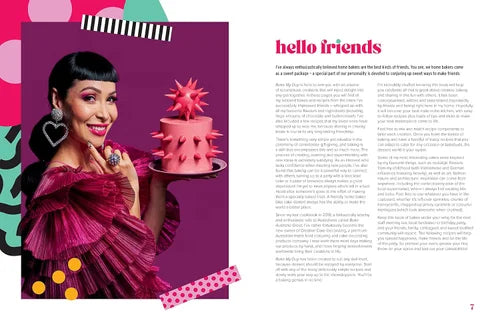 Magazine page with a woman holding a pink cake and text on a purple background