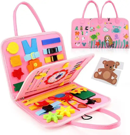 Pink educational toy set with various shapes and a carrying case on a white background