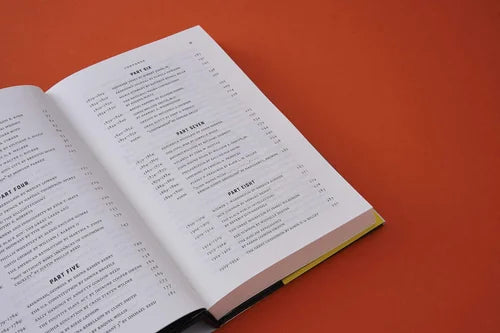 Open book with text on a red background