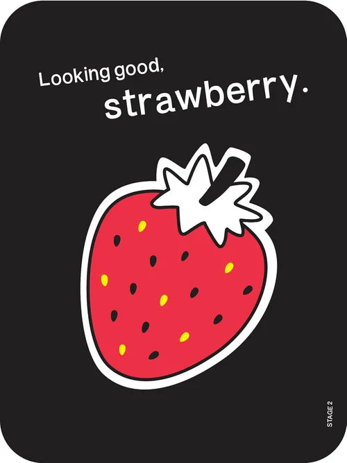 Sticker of a strawberry with 'Looking good, strawberry' text on a black background
