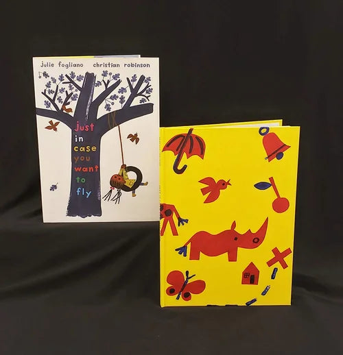 Two panels from an animated children's book featuring two cartoon dogs in a classroom setting.