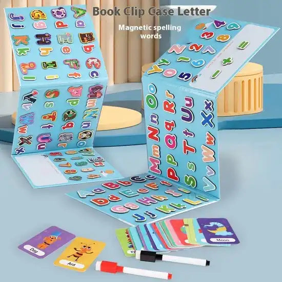 Colorful magnetic spelling word book clip case with letters and cards on a blue surface.