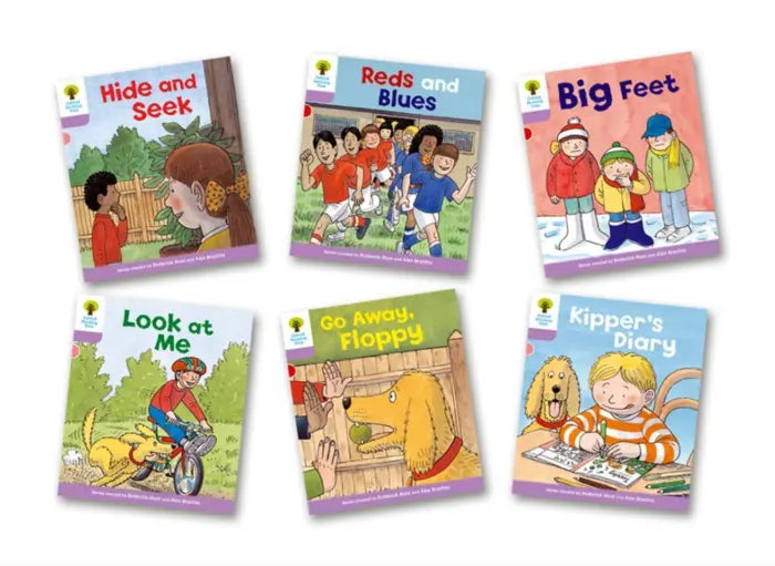 Set of children's books with colorful covers on a white background