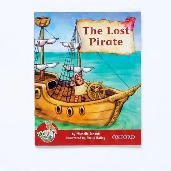 Children's book titled 'The Lost Pirate' from the Voyages series by Oxford, featuring an illustration of a pirate ship on turquoise water.