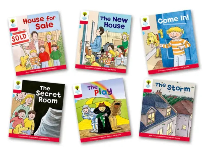 Collection of children's books with colorful covers on a white background