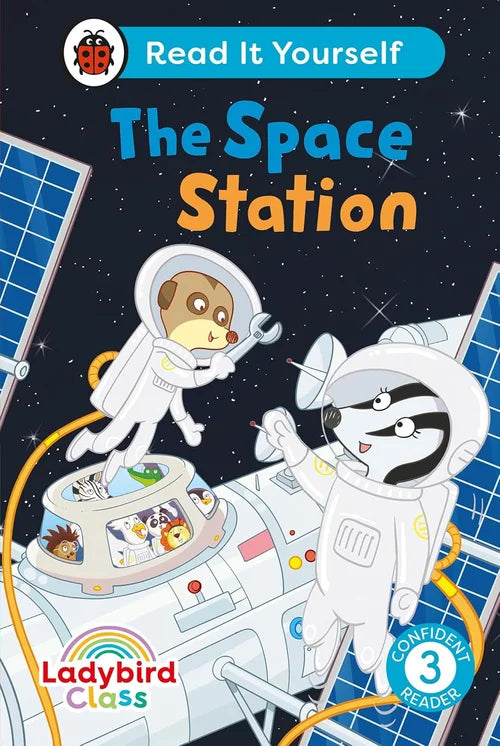 Book cover of 'The Space Station' with cartoon characters in space suits and Ladybird logo.