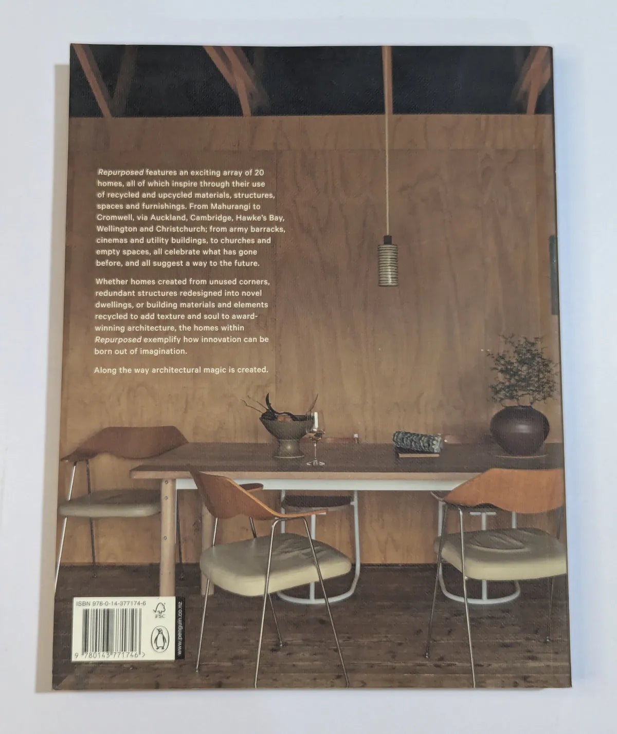 Book cover with a dining scene featuring chairs and a table on a wooden floor.