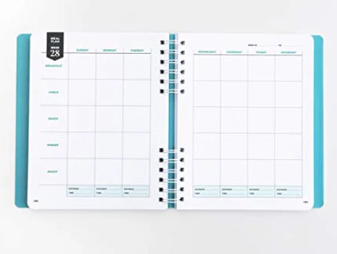 Open planner with weekly layout on a white background