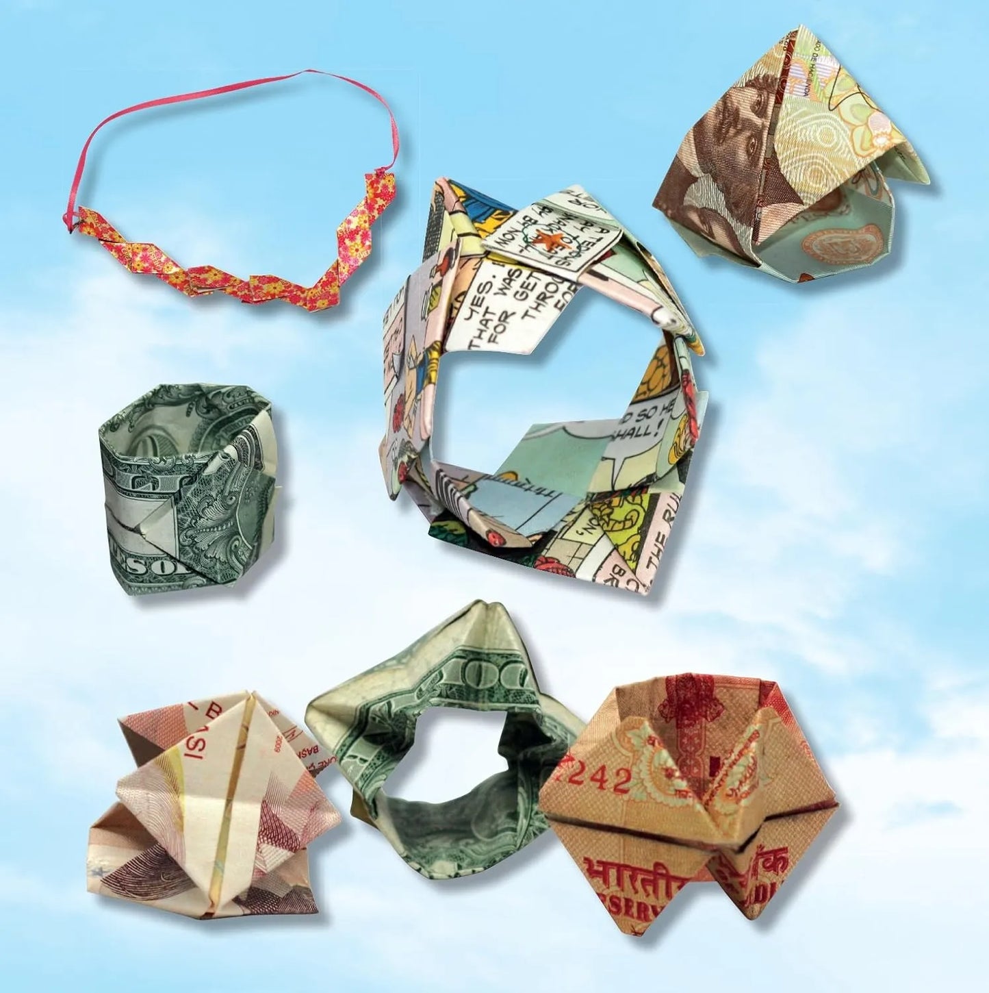 Origami creations made from various currencies on a blue background