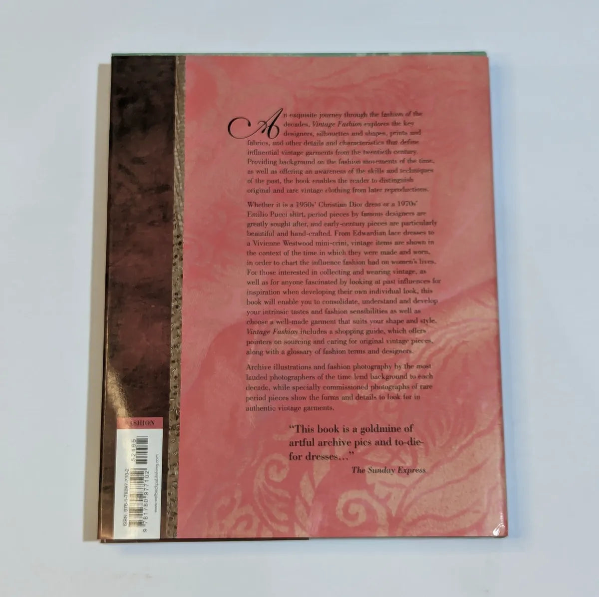 Back cover of a book with text and decorative elements on a light gray background