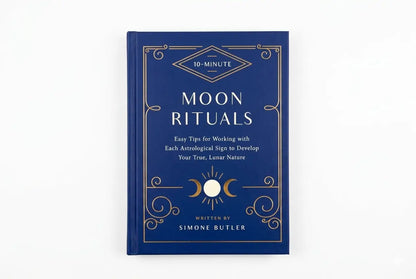 Blue book titled 'Moon Rituals' by Simone Butler on a white background