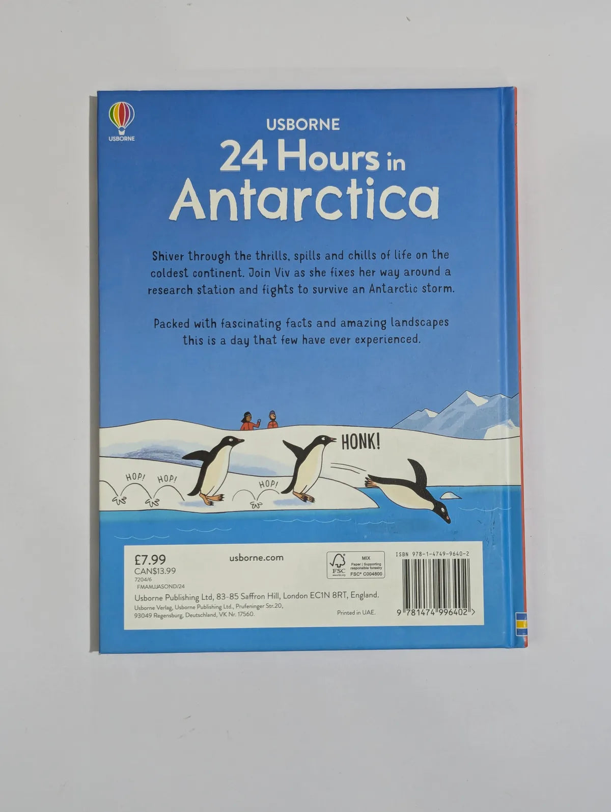 Book cover of '24 Hours in Antarctica' by Usborne on a gray background