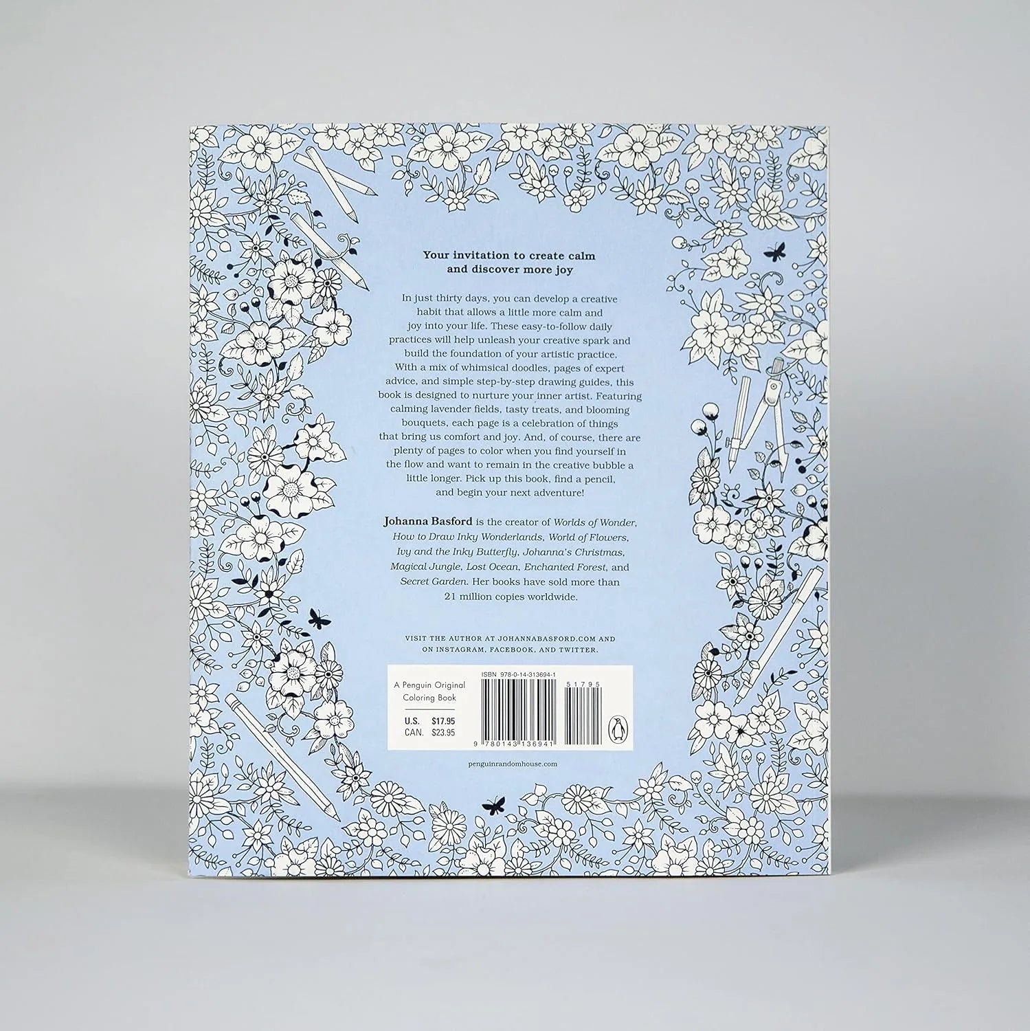 Book cover with floral design and text on a gray background