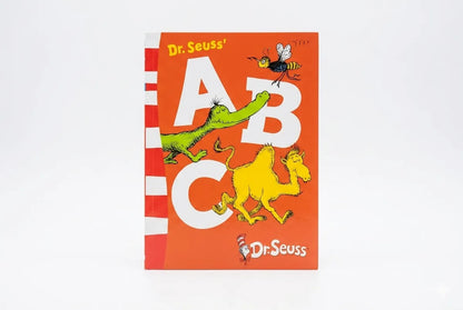 Dr. Seuss book cover with animals and letters on an orange background