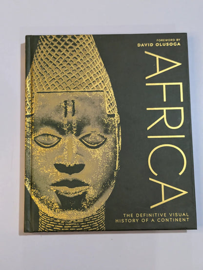 Book titled 'Africa' with a gold face design on a black background