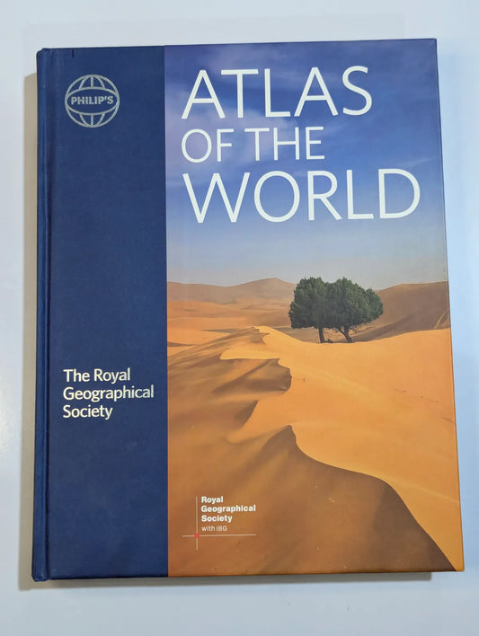 Atlas of the World by The Royal Geographical Society on a light blue background