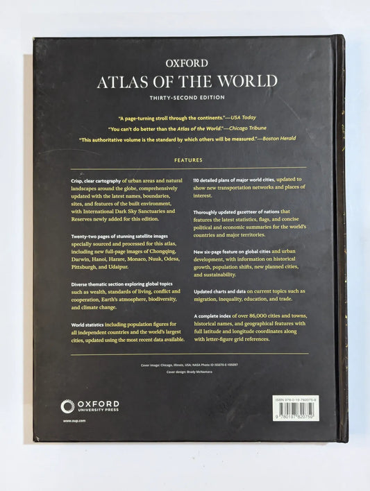 Back cover of the Oxford Atlas of the World on a white background
