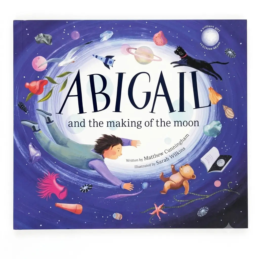 Children's book cover titled 'ABIGAIL and the making of the moon' by Matthew Cunningham, illustrated by Sarah Wilkins. The cover features a whimsical space illustration with a child floating in space, the moon, planets, a black cat, and a teddy bear on a dark blue background.
