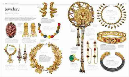 Collection of gold jewelry displayed against a white background