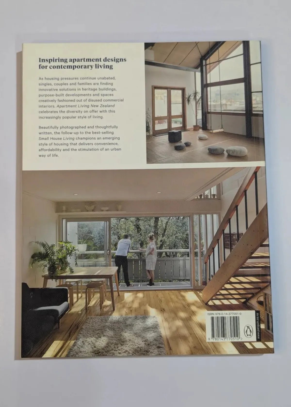 Book or magazine page with interior design images and text on a light gray background