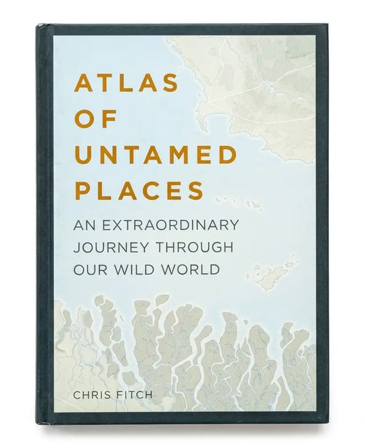 Atlas of Untamed Places book by Chris Fitch, featuring a dark gray hardcover and a cover design with a light blue map background, gold title text, and black subtitle text.