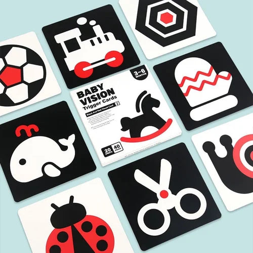 Baby Vision trigger cards with various shapes and objects on a light blue background