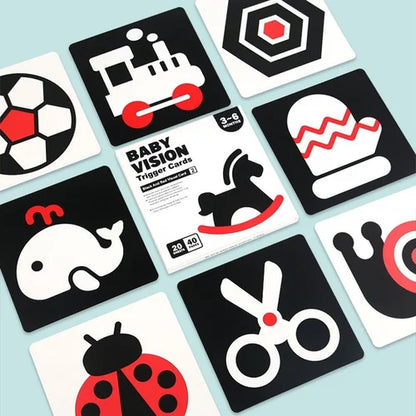 Baby Vision trigger cards with various shapes and objects on a light blue background