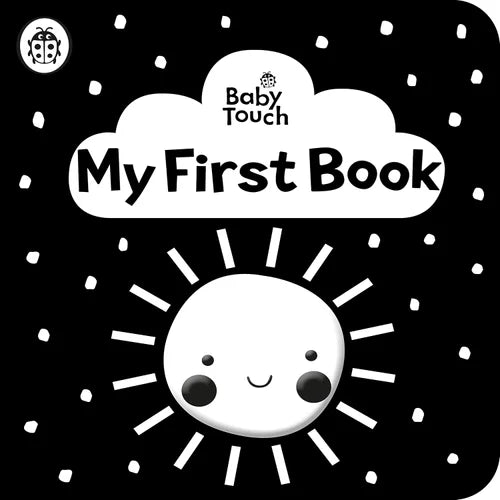 Baby Touch 'My First Book' cover with a smiling moon on a black background