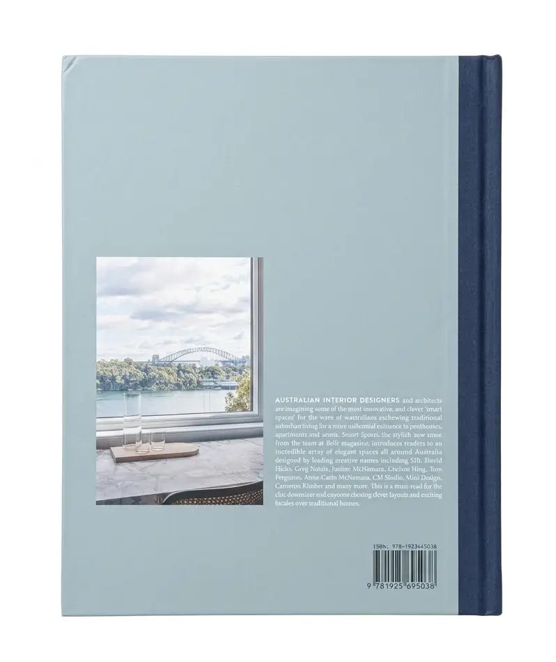 The back cover of a book, featuring a light blue background, a photograph of a waterfront scene with a bridge, descriptive text, and a dark navy spine band on the right.