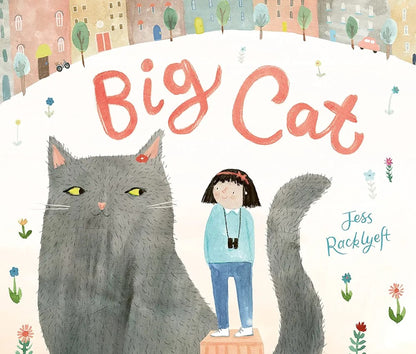 Cover of the book 'Big Cat' illustrating a large grey cat with a young girl standing in front, set against a colorful cityscape background.