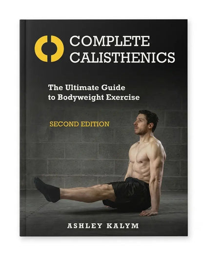 The book cover of 'Complete Calisthenics: The Ultimate Guide to Bodyweight Exercise' by Ashley Kalym, Second Edition. The cover features a dark gray background with a yellow circular logo, white and yellow text, and a photo of a shirtless man performing a bodyweight exercise.