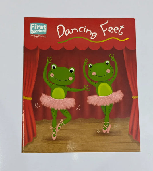 Book cover of 'Dancing Feet' with two green frogs in ballet costumes on a stage.
