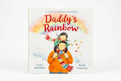 Book cover of 'Daddy's Rainbow' with a father and child illustration on a white background.
