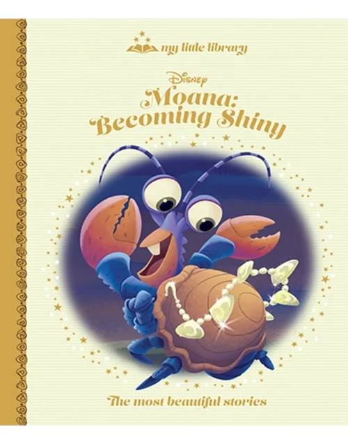 Children's book cover featuring a cartoon crab with a shell and pearls, titled 'Moana: Becoming Shiny'.