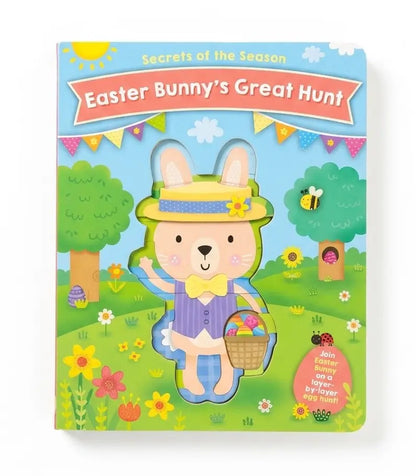 A children's board book titled 'Easter Bunny's Great Hunt' from the 'Secrets of the Season' series. The cover features a colorful cartoon Easter bunny in a yellow hat and purple outfit, holding a basket of eggs in a grassy field with trees and flowers.