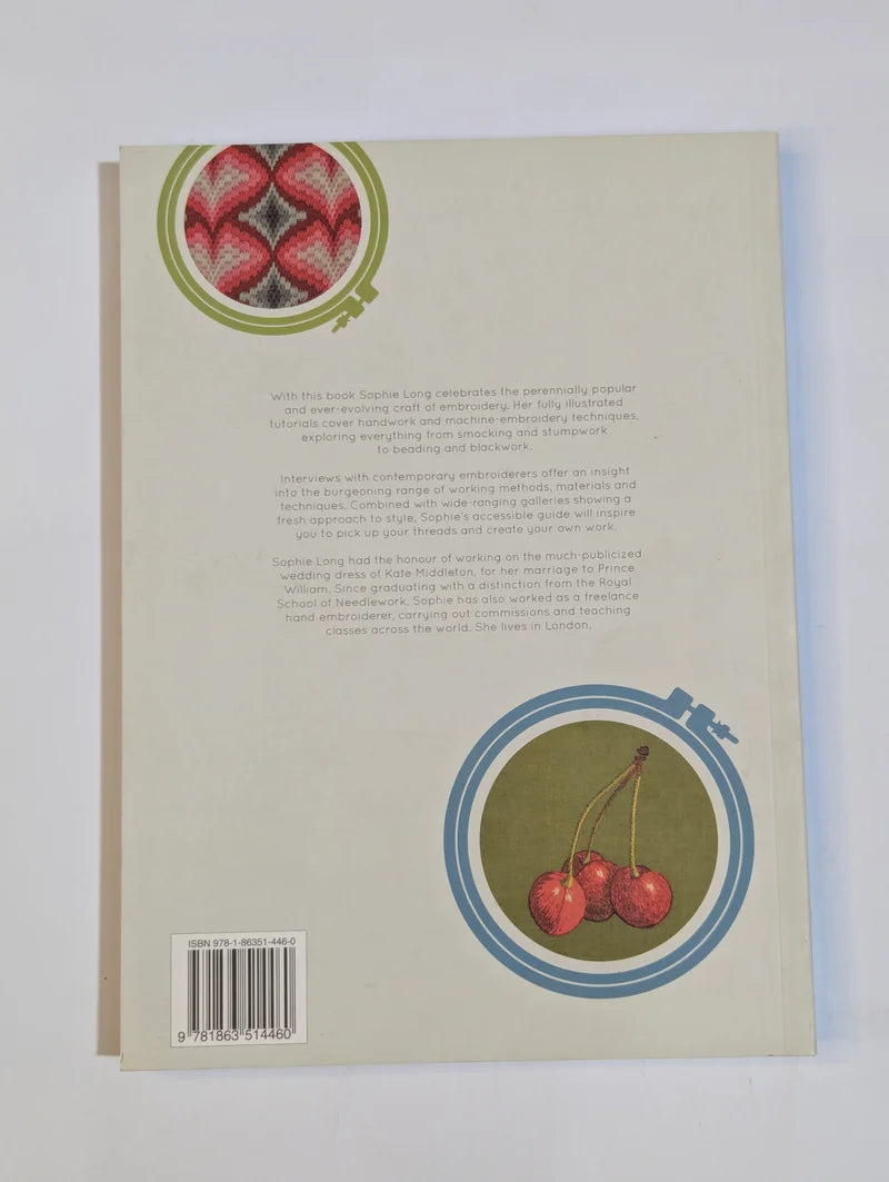 Book back cover with cherry illustration and text on a light gray background