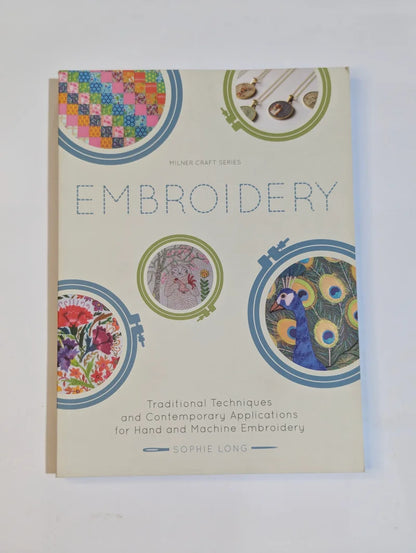 Book titled 'Embroidery' with colorful embroidery designs on the cover, on a white background.