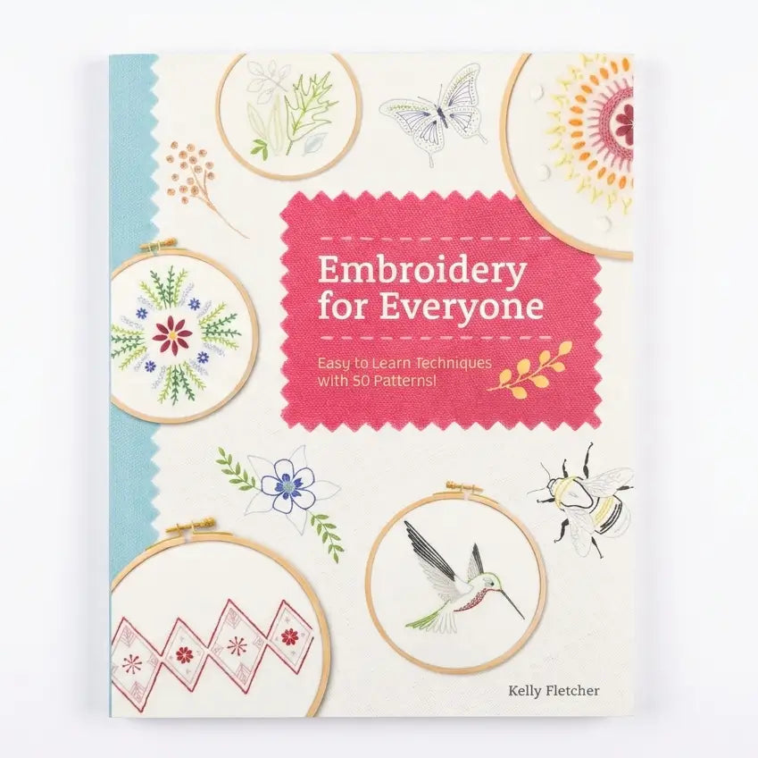 Book cover of 'Embroidery for Everyone' with embroidery patterns on a white background
