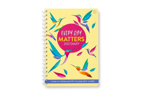 2021 diary with colorful hummingbird design on a yellow background