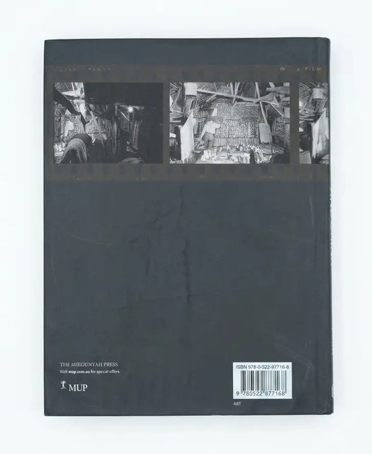The back cover of a hardcover book titled 'The Axiom: Vision and the Art of Video' published by The Axiom Press, featuring three black-and-white documentary stills across the top and a barcode at the bottom right.