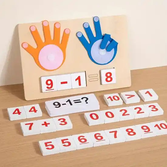 Educational math toy with hand prints and number tiles on a wooden board