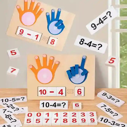 Educational math game with hand-shaped cutouts and number cards on a wooden surface.
