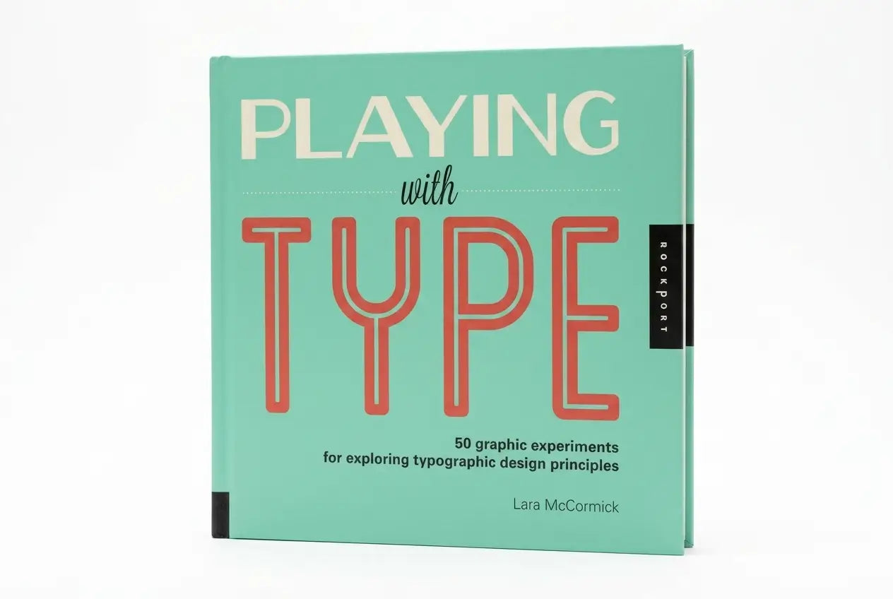 Book titled 'Playing with Type' on a white background