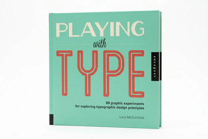 Book titled 'Playing with Type' on a white background