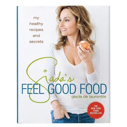 The front cover of the book 'My Healthy Recipes and Secrets: Giada's Feel Good Food' by giada de laurentiis, featuring a smiling woman holding an apple on a white background.