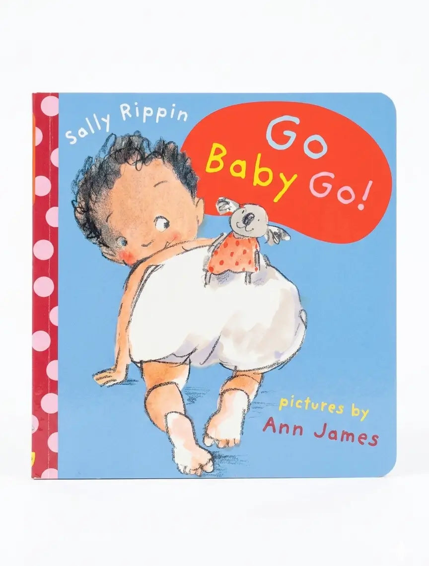 Book cover of 'Go Baby Go!' with a child holding a rabbit and a speech bubble saying 'Go Baby Go!'.