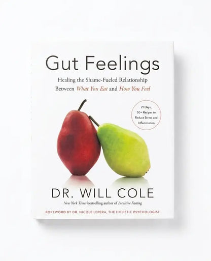 The book cover of 'Gut Feelings' by Dr. Will Cole, featuring a white background with a red pear and a green pear in the center, and black text.